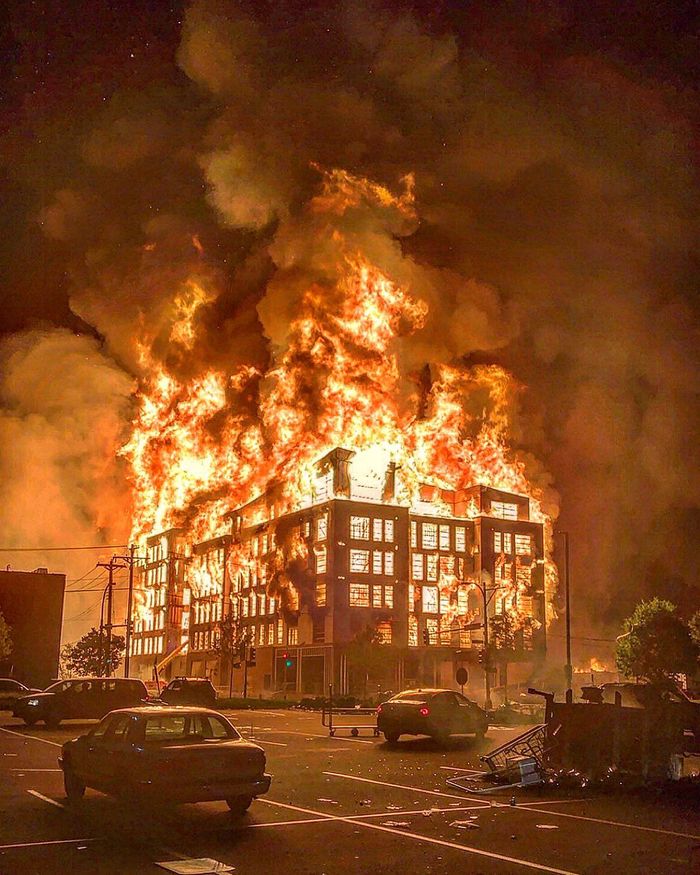A building in downtown Minneapolis burns